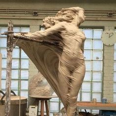 a sculpture is being made in an art studio