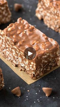 chocolate peanut butter granola bars on a black surface