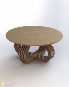 a round table with an abstract design on it's base and the word love spelled in gold