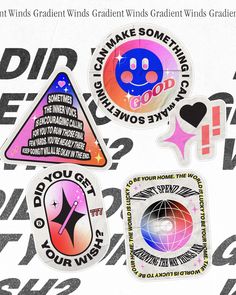 some stickers that are on the side of a white paper with black and pink designs