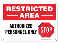 a red and white sign that says restricted area authorized personnel only