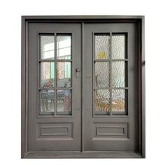 two double doors with glass panels on each side