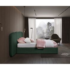 a green bed with pink pillows in a bedroom next to a large window and chair