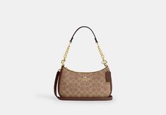 Teri Shoulder Bag In Signature Canvas | COACH OUTLET Teri Shoulder Bag In Signature Canvas, Trendy Shoulder Bags, Coach Teri Shoulder Bag, Sling Bag Mini, Designer Shoulder Bag, Sustainable Bag, Bag With Chain, Halloween Bags, Coach Outlet