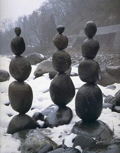 rocks stacked on top of each other in the snow