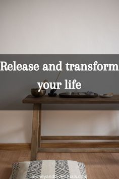 a wooden bench sitting on top of a hard wood floor