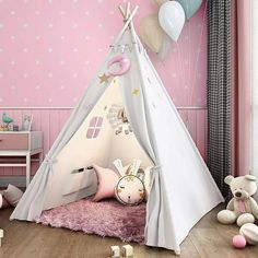 a child's room with pink walls and white stars on the wall, including a teepee tent