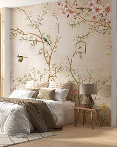 a bedroom with floral wallpaper and white bedding, along with a wooden floor