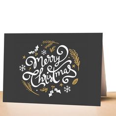 a card with the words merry christmas written in gold and white on a black background