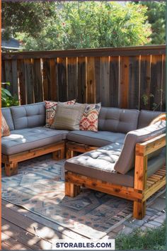 a couch sitting on top of a wooden deck