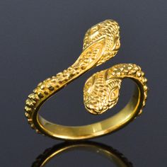 SNAKE RING ~ 18K GOLD VERMEIL over GENUINE SOLID 925 STERLING SILVER  Item #:184  0386 Type of ring: 18K Gold Vermeil over solid 925 Sterling Silver ring  Design of ring: SNAKE RING exceptionally fine detail. Material: 18K Gold Vermeil over genuine solid Sterling Silver ~ 18K gold-plated 3-microns.  Plating: Very thick and durable ~ 3-microns 18K yellow Gold Vermeil over solid 925 Sterling Silver  Amount: 1 (one) individual piece * All photos are taken from the actual item *  Weight: approx. 3.3 Silver Ring Design, Silver Ring Designs, Gold Alloys, Silver Coat, Snake Ring, Vermeil Jewelry, Types Of Rings, Gold Plated Jewelry, Jewelry Plate