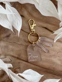 Mama keychain can be personalized Up to 5 names can be added  Measures 3.5 tall Frost Acrylic Gold Cross Pendant Acrylic Key Chain Angel, Gifting Photography, Cricut Gift Ideas, Christian Keychain, Mama Keychain, Personalized Key Chain, Boho Crafts, Mini Rosaries, Cnc Ideas