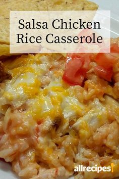 salsa chicken rice casserole on a plate with tortilla chips