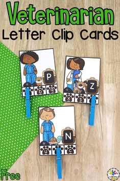 two veterinaian letter clip cards on a wooden table with green polka dot background