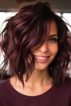 Choose deep burgundy shag with a wavy texture for a classy, rich look. The shag hairstyle is of medium length, deep burgundy in color and wavy for a natural look and professionalism. Click here to check out more trending medium-length shag haircut ideas. Fall Hair Styles Short, Red Highlights Short Hair, Burgundy Lowlights, Medium Bob Hair, Up Hair Dos, Underdye Hair, Hello 50, Pastel Rainbow Hair, Sassy Haircuts