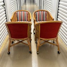 two chairs sitting next to each other in a storage room