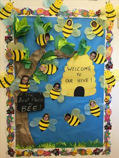 a bulletin board with bees and the words welcome to our hive