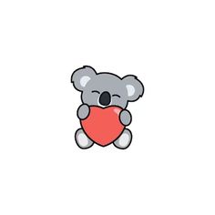 a koala holding a heart in its paws