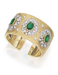 18 KARAT TWO-COLOR GOLD, EMERALD AND DIAMOND CUFF-BRACELET, BUCCELLATI. Of openwork design, set with three oval-shaped emeralds weighing approximately 3.20, 2.85 and 2.75 carats, further accented by round diamonds weighing approximately 3.95 carats, gross weight approximately 55 dwts, internal circumference 6½ inches, signed M. Buccellati Italy. Buccellati Jewelry, Silver Objects, Diamond Cuff Bracelet, International Jewelry, Italian Jewelry, Gold Cuffs, Jewelry Bracelet, Design Set