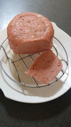 two pieces of bread sitting on top of a white plate