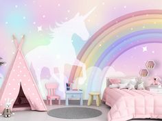 a child's bedroom decorated in pastel colors with a unicorn wall mural and teepee tent