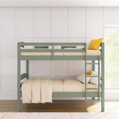 there is a bunk bed with two sets of mattresses on the bottom and top