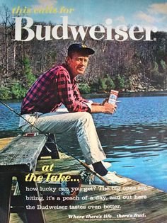 an advertisement for budweiser featuring a man sitting on a dock holding a beer