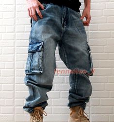 Winter Streetwear Denim Cargo Jeans, Winter Denim Cargo Jeans For Streetwear, Hip Hop Denim Bottoms For Winter, Spring Hip Hop Cargo Jeans In Denim, Spring Hip Hop Denim Cargo Jeans, Winter Hip Hop Denim Bottoms, Hip Hop Full Length Denim Cargo Jeans, Hip Hop Style Denim Jeans For Fall, Winter Denim Cargo Jeans With Cargo Pockets