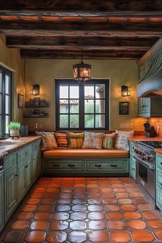 a kitchen with green cabinets and an orange tile floor is pictured in this image from the inside