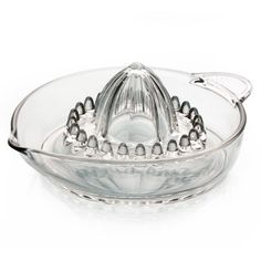 a glass bowl with silver beads on it