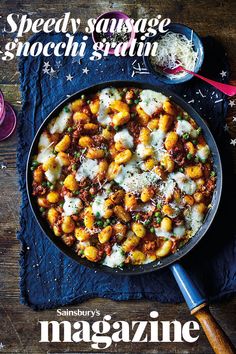 a magazine cover with a skillet full of food