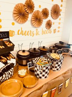 an assortment of baked goods displayed on a buffet table