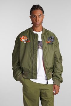 Ma1 Bomber in green nylon, bomber collar, long sleeves, zip closure, side pockets, zip pocket on sleeve, back embroidery, ribbed cuffs and bottom, 100% Nylon, Made in IndiaGender: MenMaterial: NYLONColor: GREENMade in: ITProduct ID: 408504_5345*Import tax/duty will be calculated at checkout (If applicable) Green Bomberjack Outfit Men Aesthetic, Solid Military Long Sleeve Windbreaker, Military Long Sleeve Nylon Outerwear, Back Embroidery, Men's Bomber Jacket, Military Nylon Outerwear With Multiple Pockets, Stone Island Shadow Project, Marni Bag, Couture Outfits