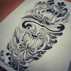 an artistic tattoo design with flowers and swirls on the side of a sheet of paper