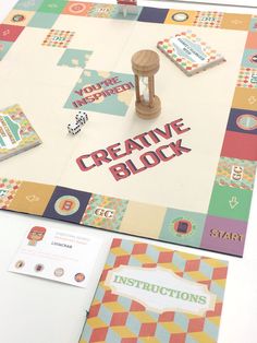 an interactive board game for children with creative blocks and instructions on the front, along with other games