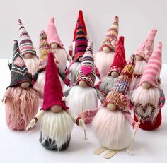 several small gnomes with different hats on them