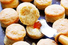 a close up of some muffins with ketchup on top