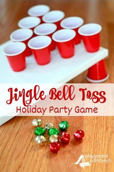 an image of a holiday party game with red and green cups on the table for jello bell toss