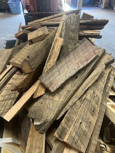 a pile of wood sitting on top of a wooden floor