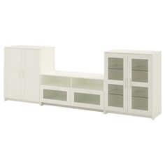 a white entertainment center with glass doors and shelves