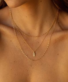 Effortlessly chic, a timeless necklace. Available in 14k solid gold, or 14k gold filled & multiple length options. Safe to shower in & wear 24/7. Tiny tag charm measures approx: 11.5mm x 5mm Dainty Gold Necklaces, Timeless Necklace, Tiny Tags, Hair Cuffs, Dainty Gold Necklace, Gold Necklaces, Chain Anklet, Tag Necklace, Ring Bracelet