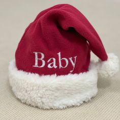 Plush And Oh-So Sweet, Our Well-Made, Plush, Non-Itchy Santa Hat Adds Some Charm To Your Holidays. Get Into The Holiday Spirit With A Personalized Santa Hat. They’re Crafted From The Softest Materials And Can Be Personalized. They Will Not Make Your Forehead Itchy. Deluxe Plush Santa Hats, Different Size/Embroidery Letter Choice For The Whole Family Match. Perfect For Most Adult And Baby. Great For Holiday Costume Parties! Moreover It's For Christmas, Halloween, Party, Birthday, New Year, Or Eve Green Winter Hat, Halloween Party Birthday, Minion Hats, Toddler Girl Fall, Newborn Beanie, Baby Letters, Embroidery Letter, North Face Kids, Stocking Hat