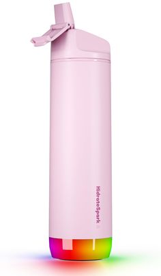 a pink thermos bottle on a white background with colored light coming from it