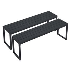 two black benches sitting next to each other on a white background and one bench is empty