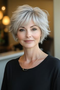 1. Classic Layered Pixie in Soft Silver (Hairstyles For Older Women With Thin Hair) - Hairstyles For Older Women With Thin Hair Silver Hairstyles, Wispy Layers, Older Women's Hairstyles, Layered Pixie, Hairstyles For Older Women, Stylish Hairstyles, Choppy Bob Hairstyles, Chin Length Hair, Short Grey Hair