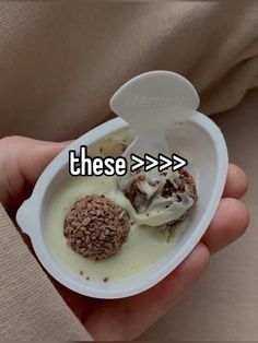 a person holding a bowl with food in it that says, these > > >