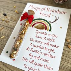 a christmas poem is displayed on a table with pine cones and candy canes in the foreground