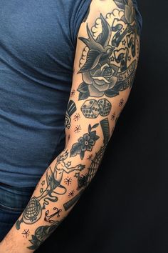 a man with a tattoo on his arm