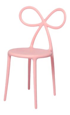 a pink chair with a bow on the back