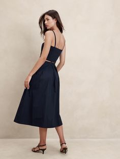 Poplin Pleated Midi Skirt | Banana Republic Factory Summer Evening Bottoms With Pleated Waist, Flared Lined Skirt For Date Night, Flattering Midi Skirt For Summer, Fitted Midi-length Lined Skirt, Gathered Midi Skirt For Evening, Flared Skirt With Fitted Waist And Lining, Tailored Summer Cocktail Bottoms, Fitted Midi Bottoms For Date Night, Fitted Bottoms For Summer Cocktail Events